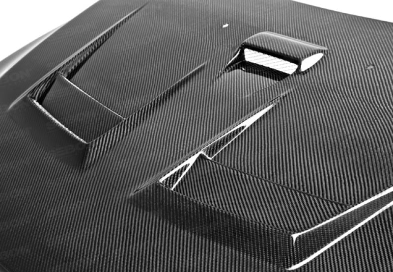 Seibon 08-12 Mitsubishi Lancer Evo X DV-Style Carbon Fiber Hood - HD0809MITEVOX-DV