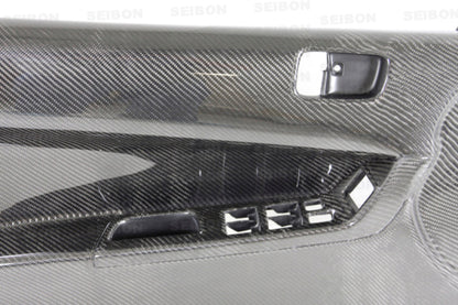 Seibon 08-12 Mitsubishi Evo Carbon Fiber Front Door Panels - DP0809MITEVOX-F