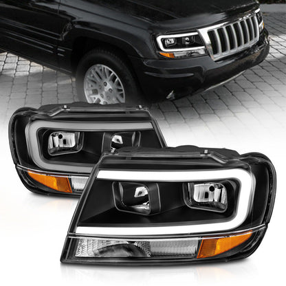 ANZO 99-04 Jeep Grand Cherokee Crystal Headlights - w/ Light - 111537