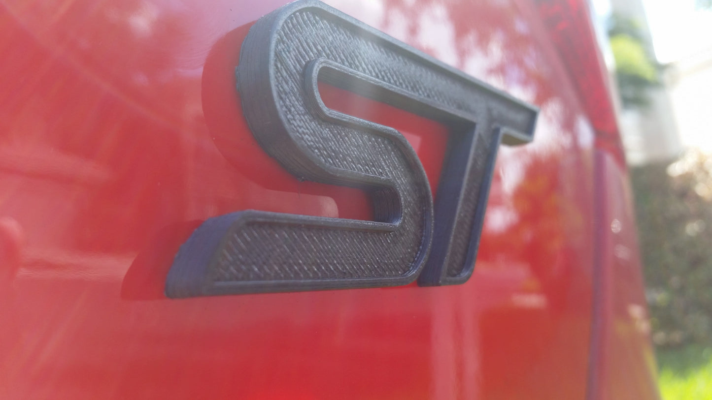 2013-2019+ Ford Focus / Ford Fiesta ST Emblem "ST" - Rear-C-Dub Tech